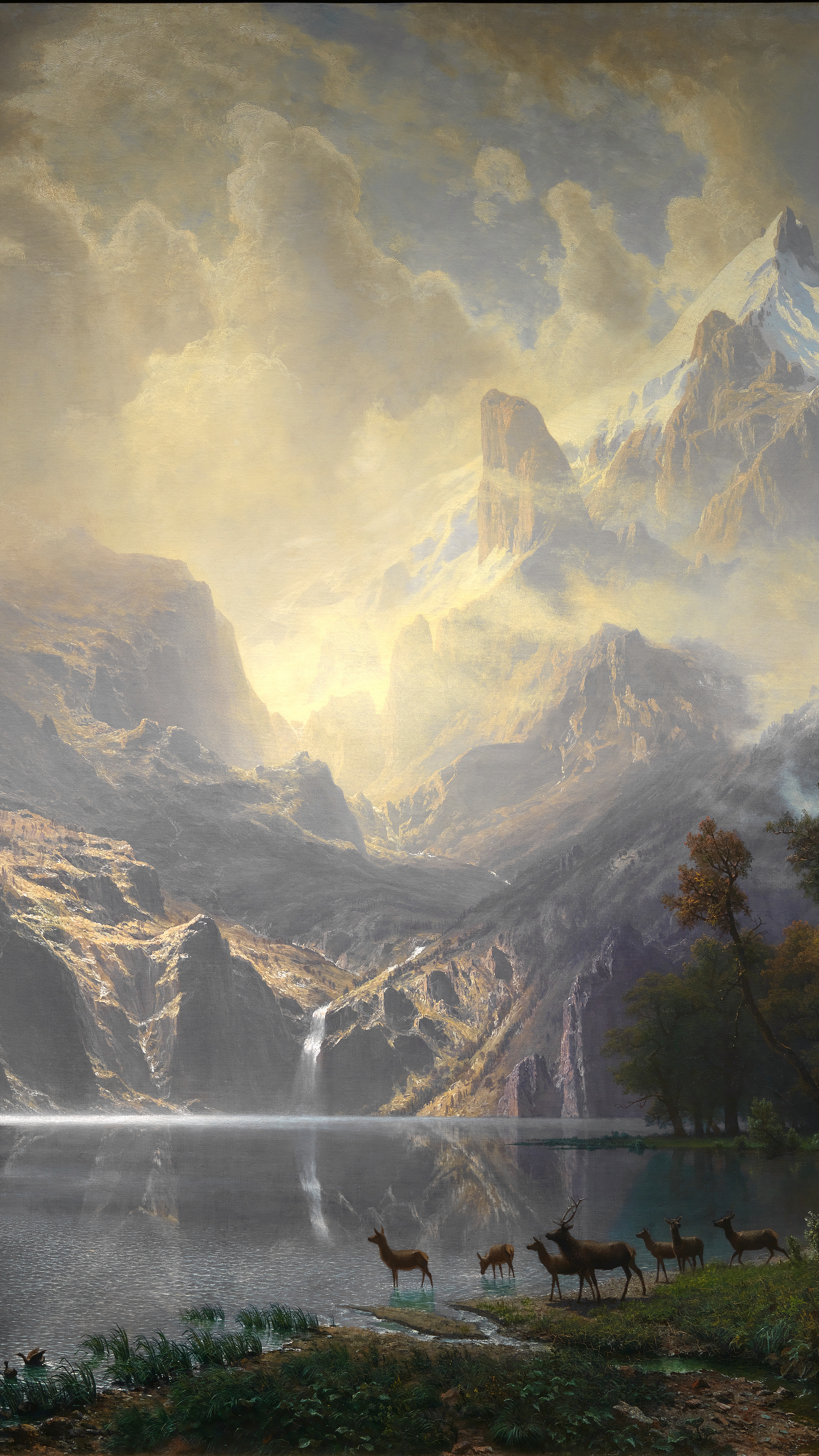 Vertical iPhone background from a painting: sunlight breaking over a mountain lake with deer at the shore and a waterfall on the cliff behind