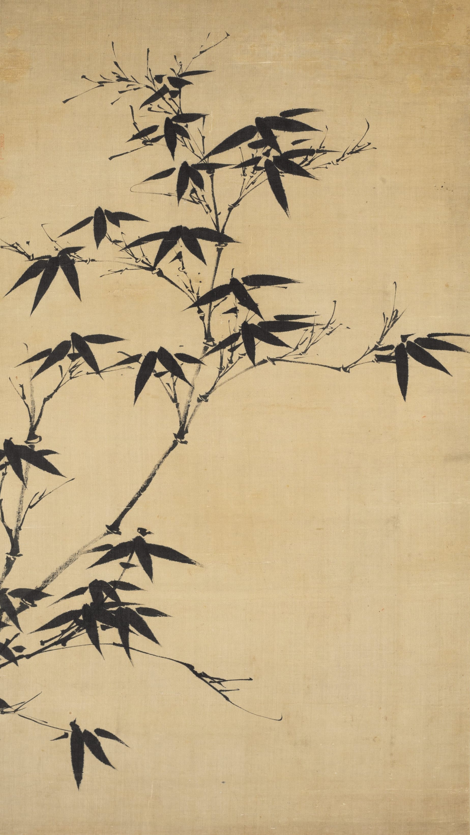 Vertical iPhone background from a Korean painting: ink bamboo branches arching diagonally across pale cream silk, sharp dark leaves, spare and minimal East Asian monochrome brushwork