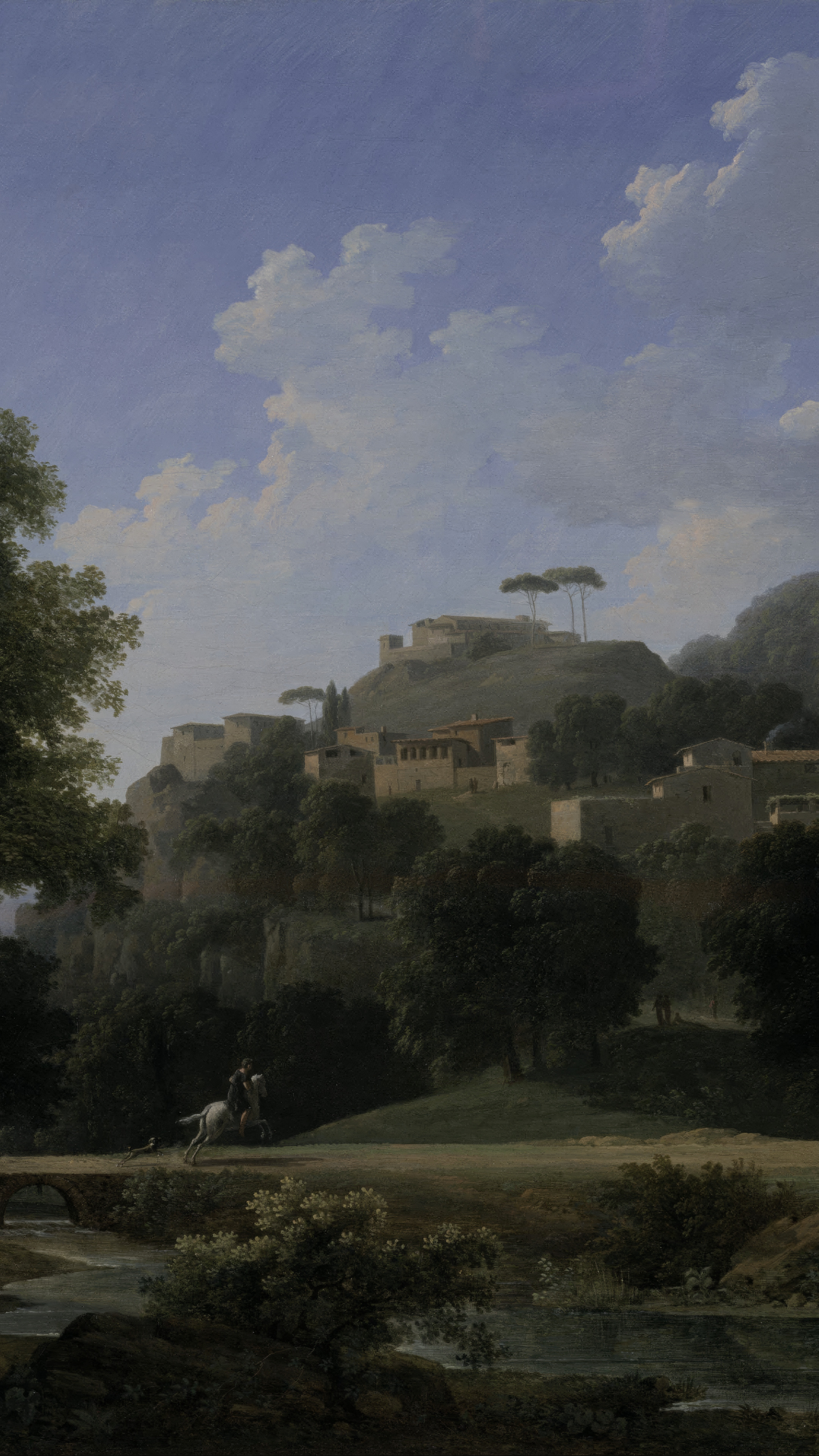 Vertical iPhone background from a painting: a hill town of pale stone houses and umbrella pines under a deep blue sky with white cloud, a rider on a grey horse on the road below, blossom and still water in front