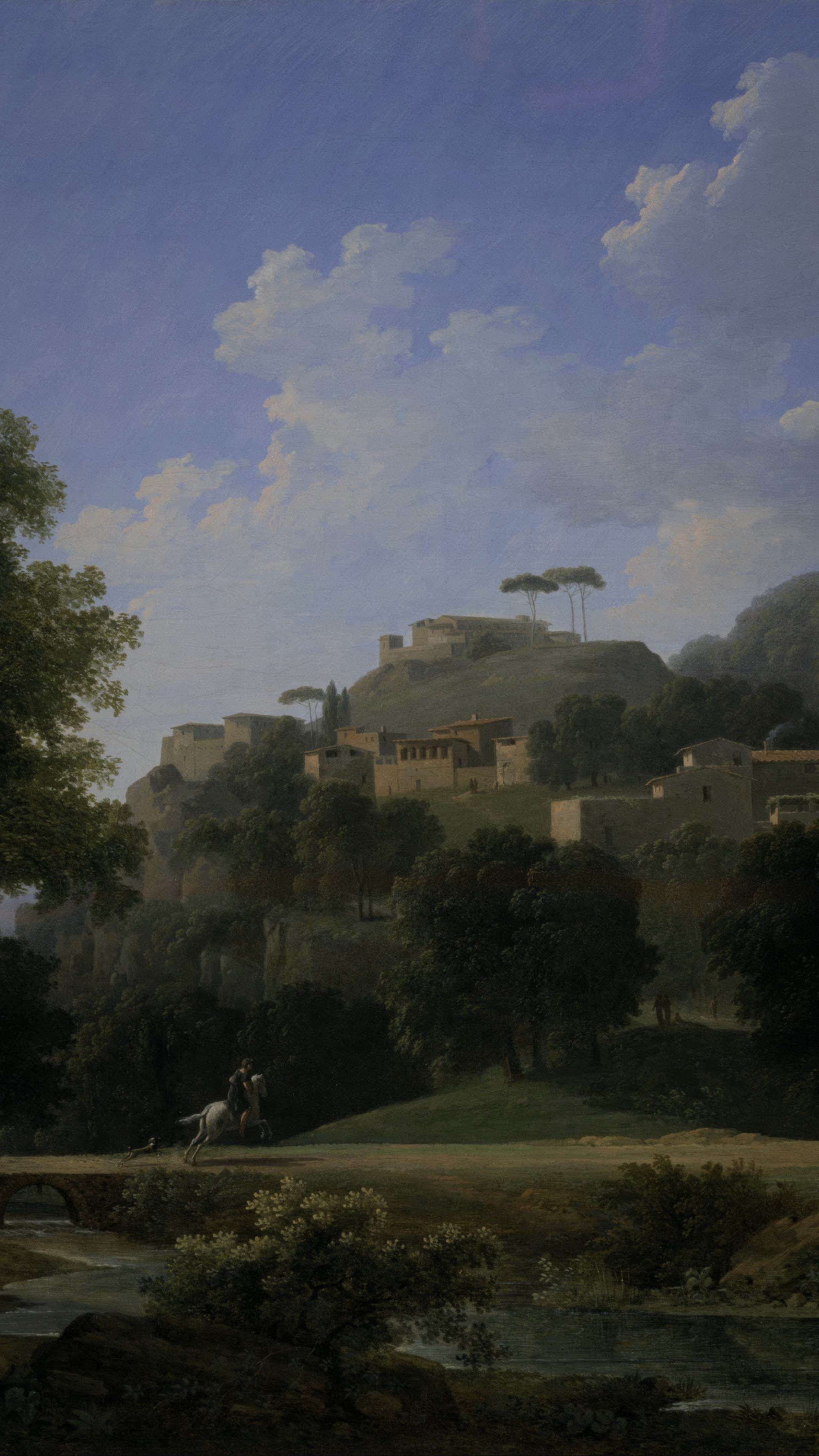 Vertical iPhone background from a painting: a hill town of pale stone houses and umbrella pines under a deep blue sky with white cloud, a rider on a grey horse on the road below, blossom and still water in front
