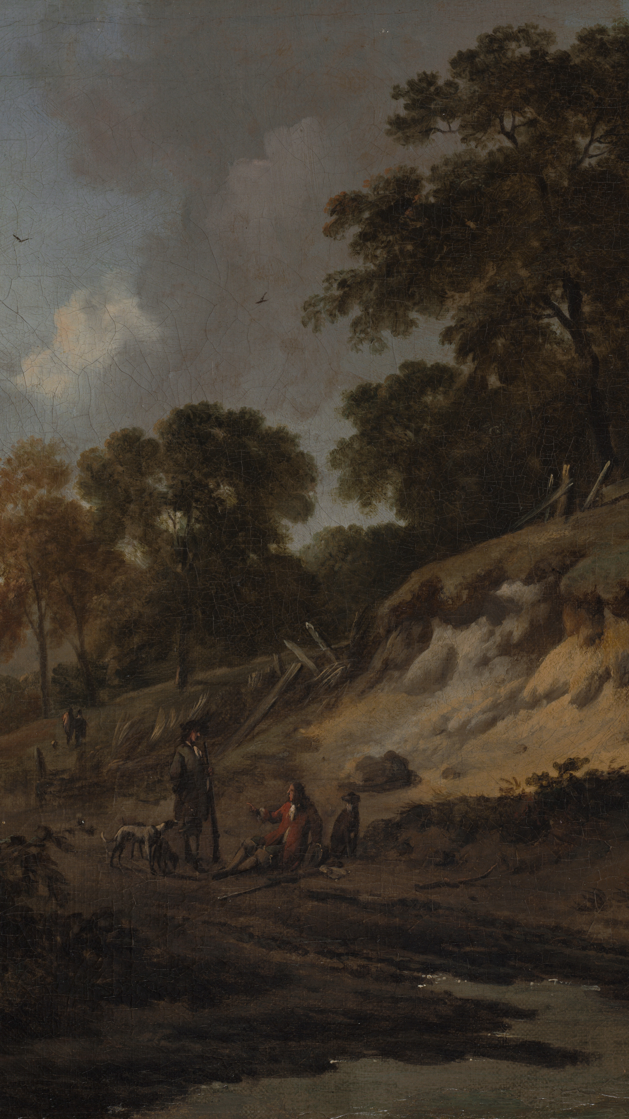 Dark academia vertical iPhone background from a painting: hunters with hounds on a rutted road beside a sandy embankment, dark autumn trees, warm golden light on a broad valley
