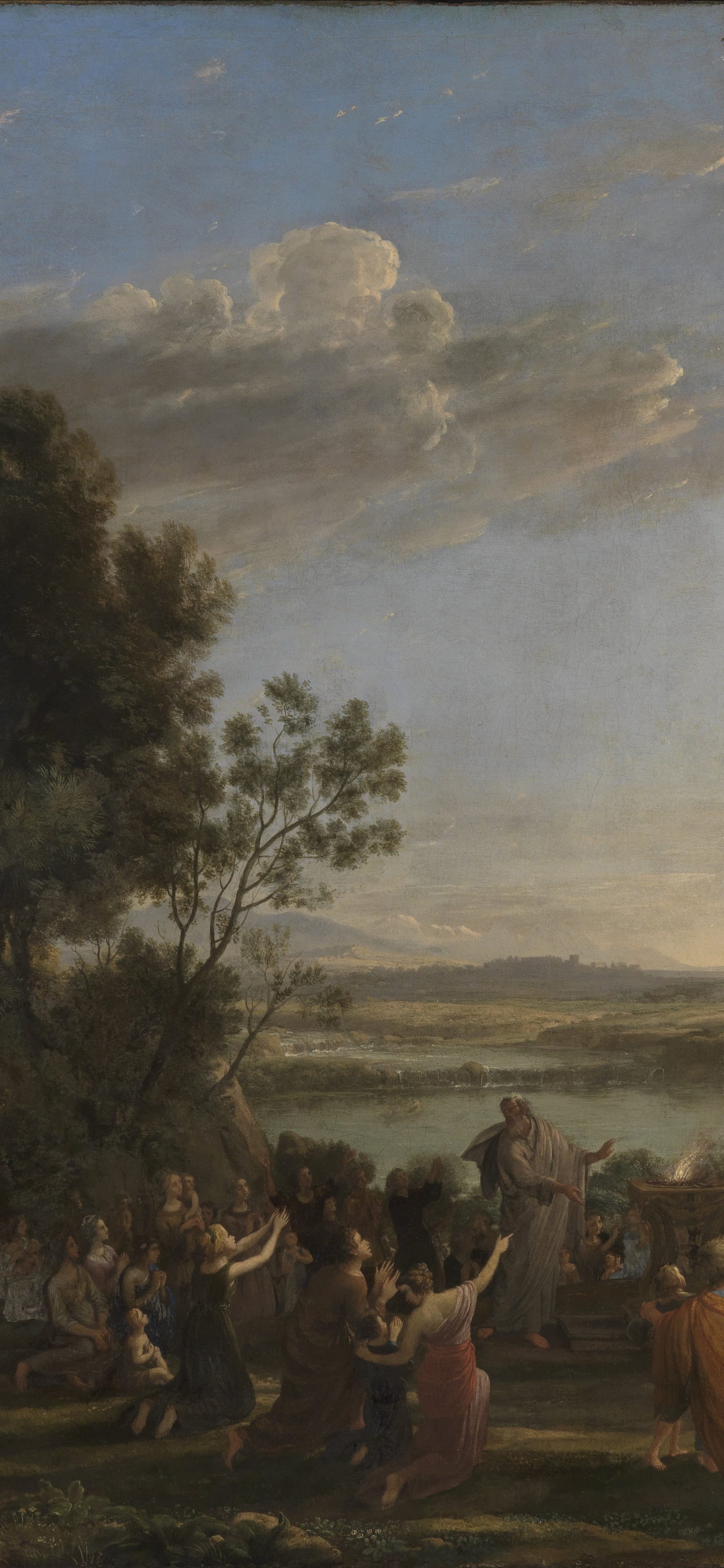 Vertical iPhone background from a painting: dark trees over a crowd on open ground in warm hazy light with hills beyond