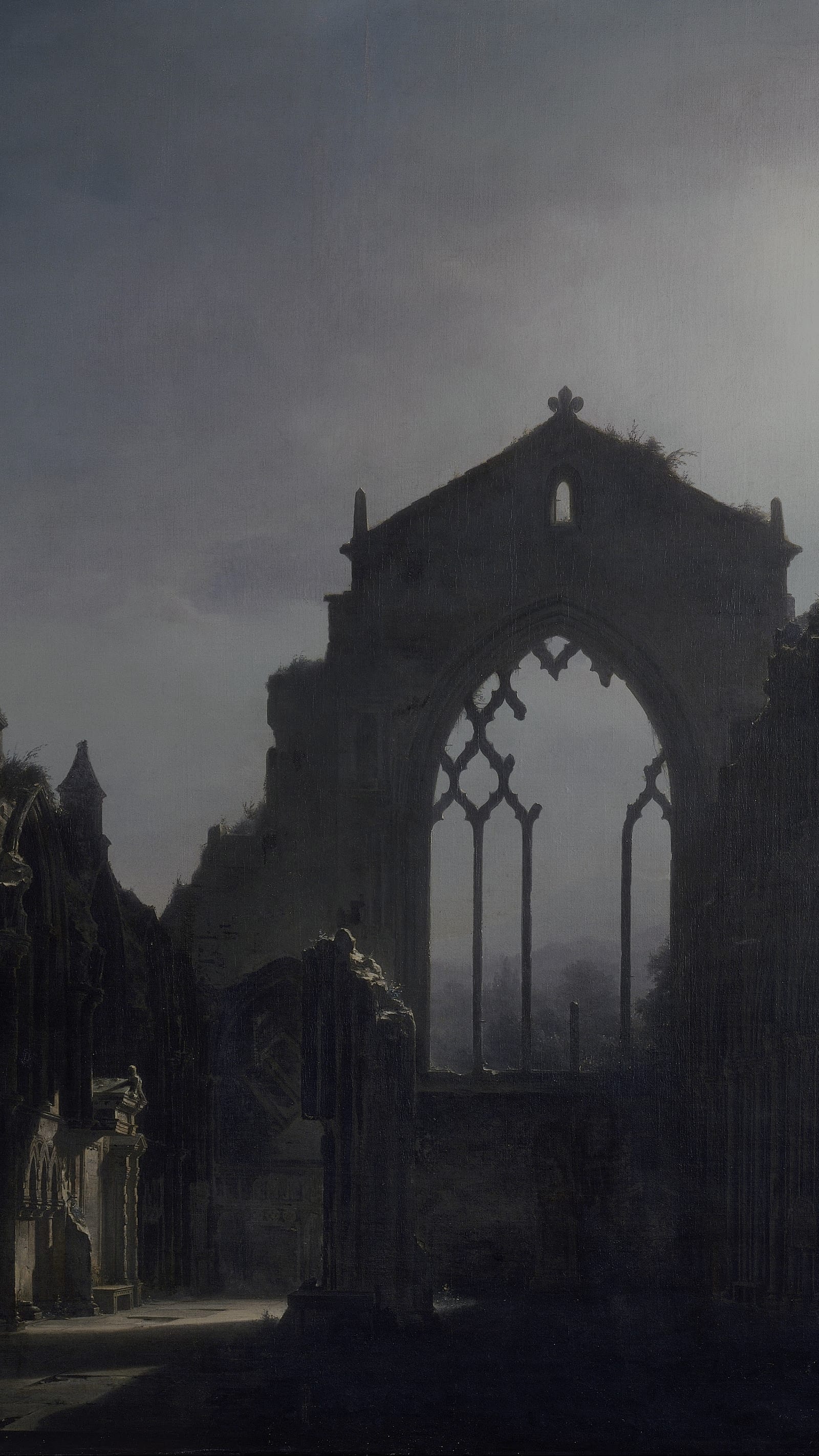 Dark moody desktop background from a painting: roofless Gothic chapel ruins lit by moonlight, pointed stone arches and empty tracery windows open to a cloudy night sky, ivy climbing the broken walls, a faint lantern glow on the flagstones below