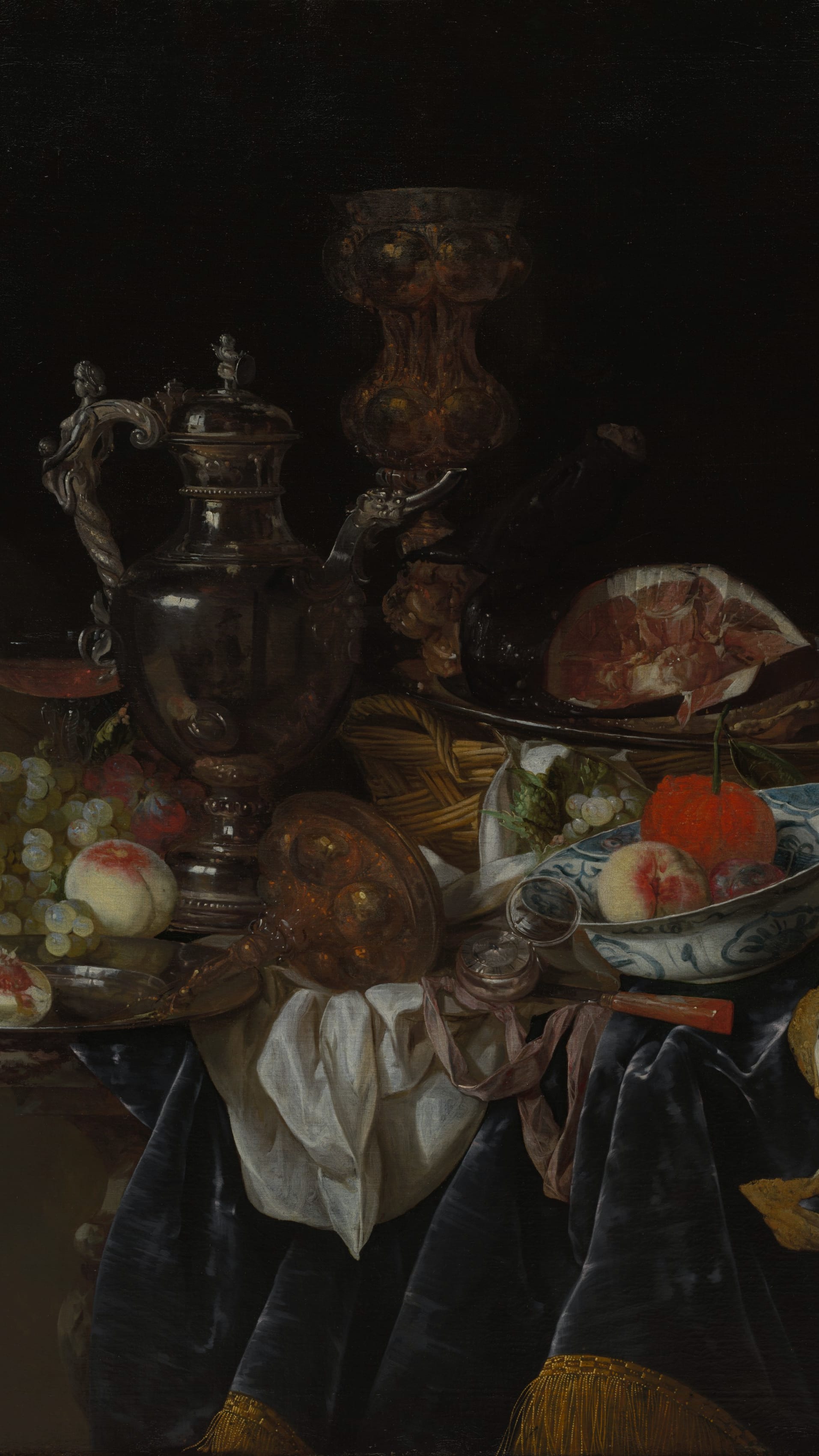Dark academia vertical iPhone background from a painting: ornate silver ewer and sliced ham on a draped table with green grapes, peaches, blue-and-white porcelain bowl, deep black background