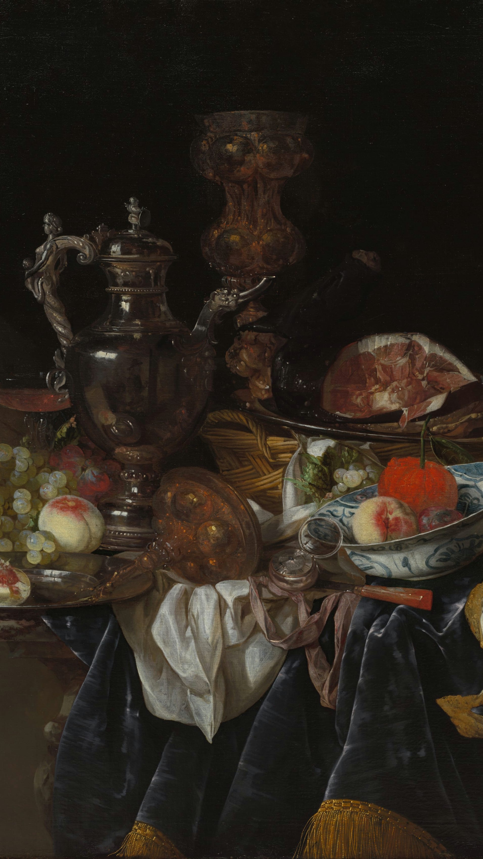 Dark academia vertical iPhone background from a painting: ornate silver ewer and sliced ham on a draped table with green grapes, peaches, blue-and-white porcelain bowl, deep black background