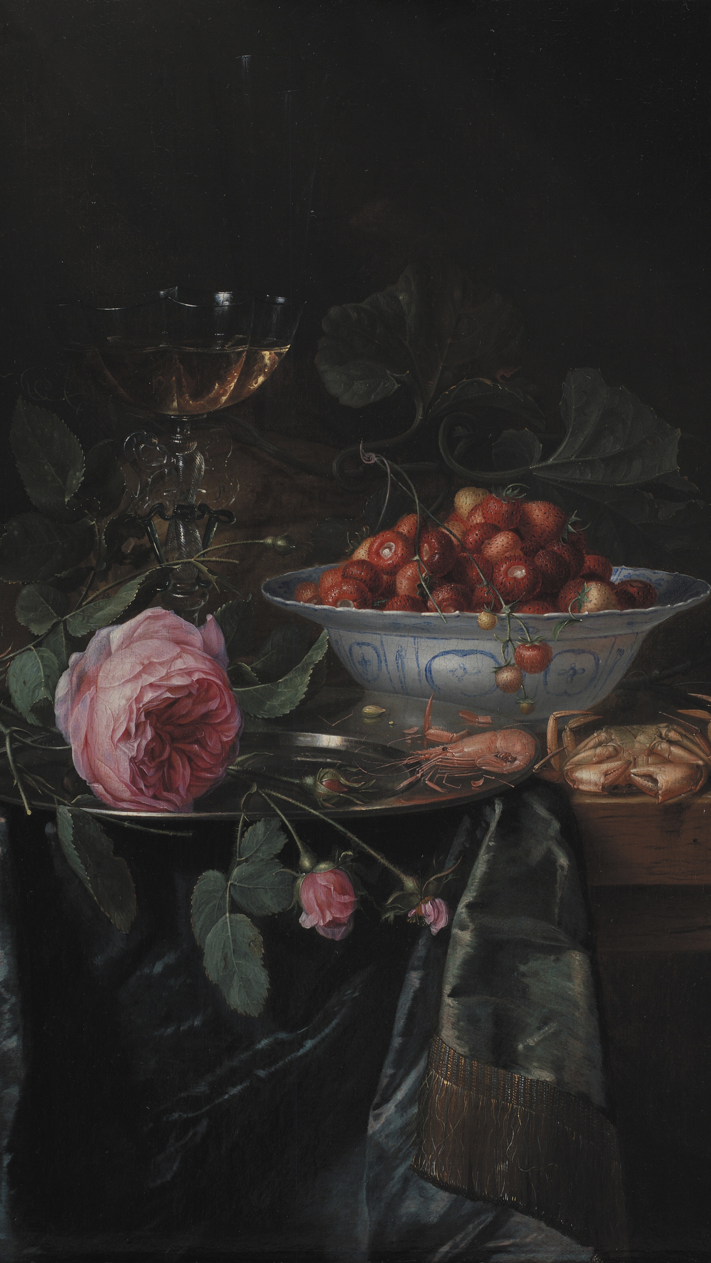 Dark academia vertical iPhone background from a painting: dark still life with pink rose, bowl of red strawberries, tall wine glass, crab and shrimp on dark satin cloth, Dutch golden age richness