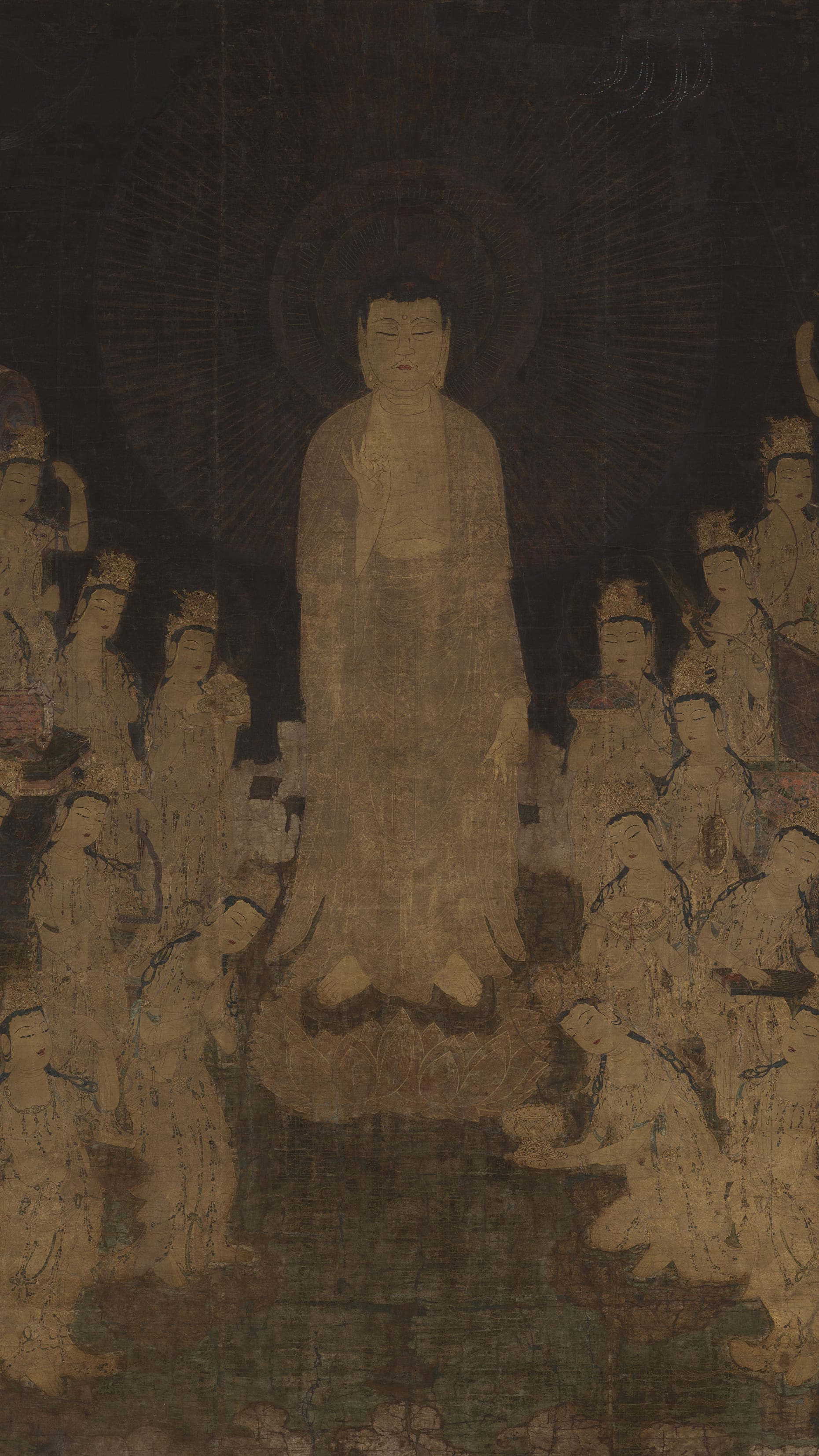 Dark moody vertical iPhone background from a Japanese painting: glowing standing Buddha descending amid a crowd of pale bodhisattvas, all in cream and gold on a near-black ground, ethereal and luminous