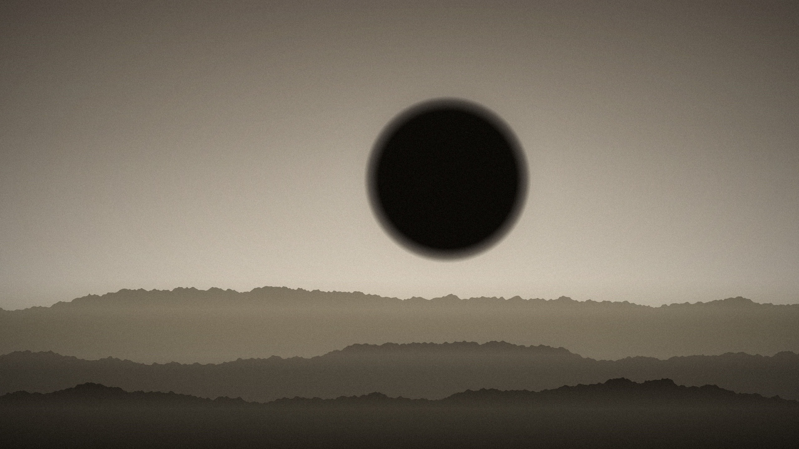 Bone-coloured desktop wallpaper: a black disc standing in a pale sky above layered ridgelines in haze