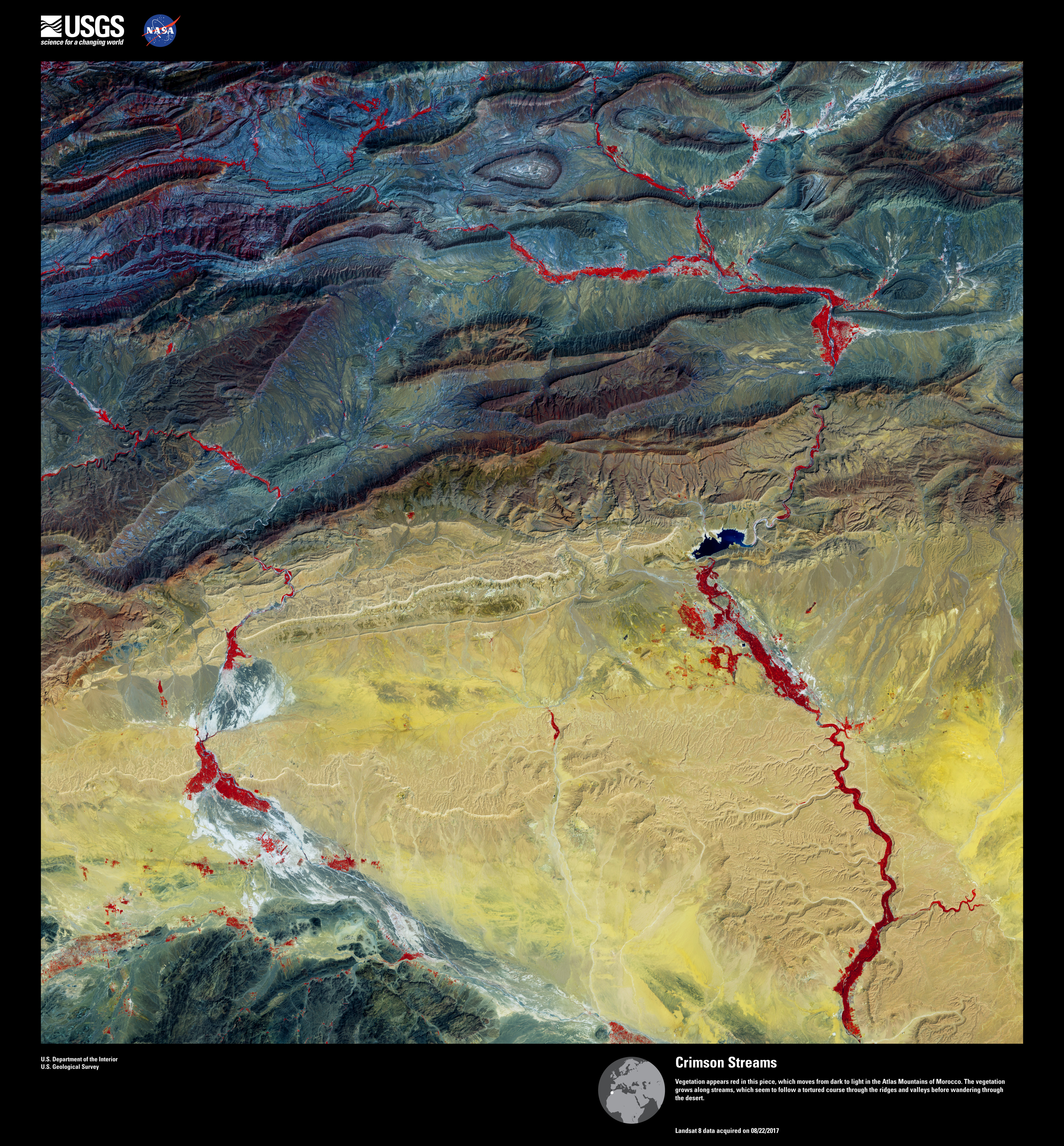 Satellite desktop wallpaper: Crimson Streams, a false-colour Landsat image — USGS Earth as Art