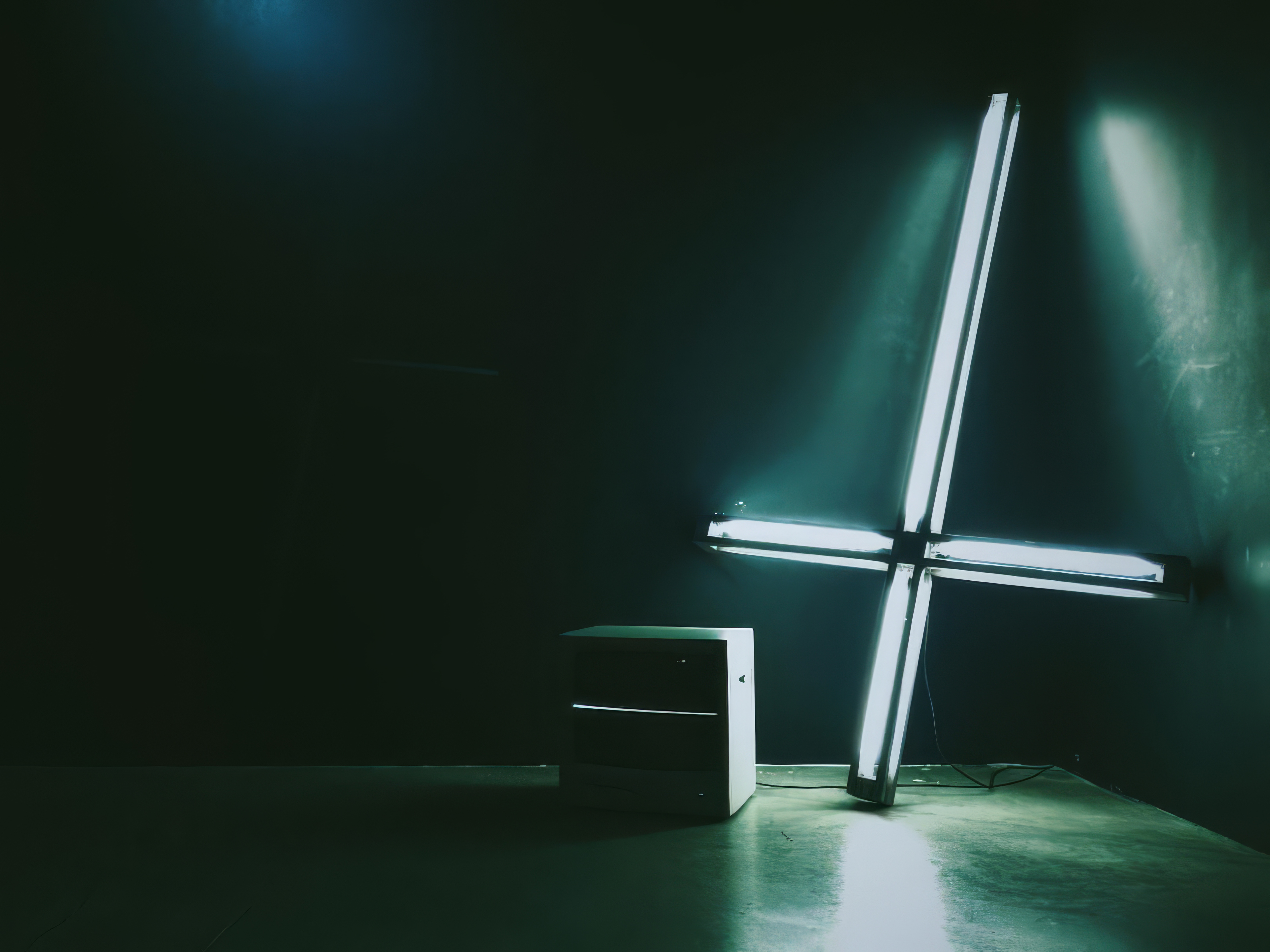 Desktop wallpaper photo: a glowing neon cross-shaped light fixture in a dark teal-lit room